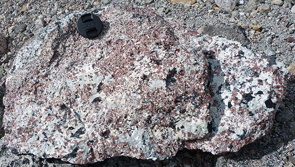 Detailed mineralogy is essential for efficient beneficiation, kakortokite from Ilímaussaq, Greenland © NERC.